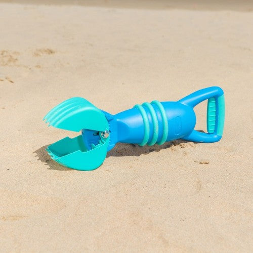 Hape Grabber Sand Toy in blue, designed for toddlers to easily pick up sand and treasures during outdoor play.