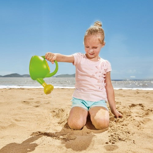 Vibrant green Hape watering can designed for kids, promoting gardening, outdoor play, and motor skill development.