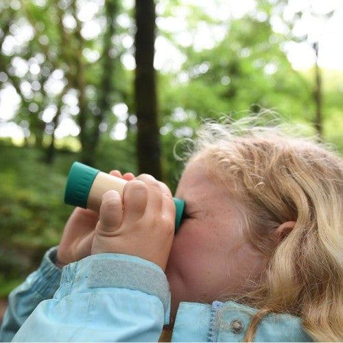 Hape Adjustable Telescope for kids aged 5+, featuring 8x magnification, sustainable bamboo design, wrist strap, and storage bag.