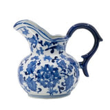 Elegant blue and white porcelain milk jar (22cm) with sculpted handle, perfect for traditional kitchen decor.