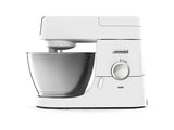 De'Longhi Chef stand mixer in white, featuring a 4.6L bowl, 1000W power, variable speeds, and multiple attachments for versatile cooking.