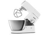 De'Longhi Chef stand mixer in white with 4.6L capacity, variable speeds, and multiple attachments for versatile food preparation.