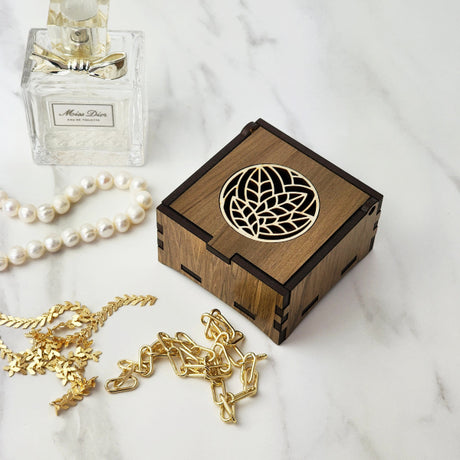 Unique 8cm trinket box crafted from reclaimed Riverwood, showcasing beautiful Rimu veneer and Pine inlay, perfect for treasures.