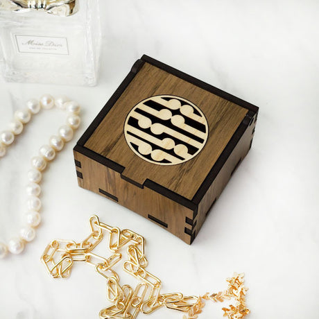 Handcrafted River Rimu Koru trinket box (8cm) with unique reclaimed wood, perfect for storing treasures or as a decorative piece.