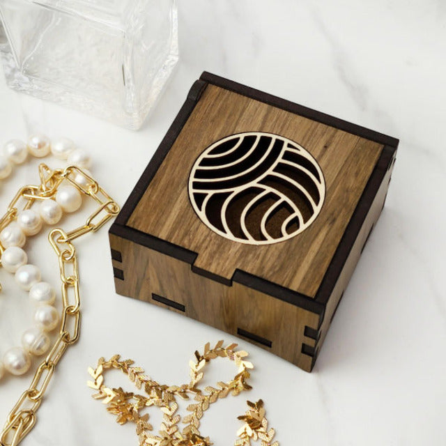 Elegant semi-circle trinket box made from reclaimed River Rimu wood, showcasing unique colors and patterns, ideal for jewelry storage.