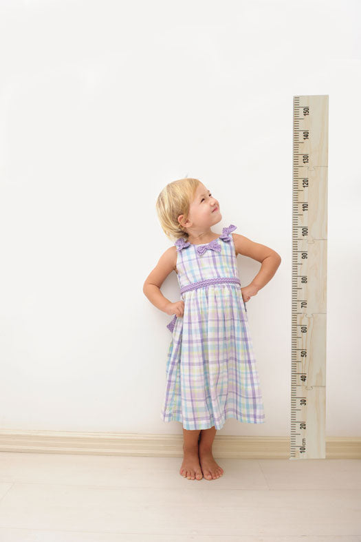 Pine Growth Chart Ruler elegantly tracks your child's height up to 1.5 meters, blending practicality with charming decor.