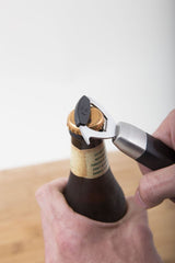 Magnetic Bottle Opener - Savannah: sleek stainless steel tool with a magnet, built-in ring lifter, and dishwasher safe design.