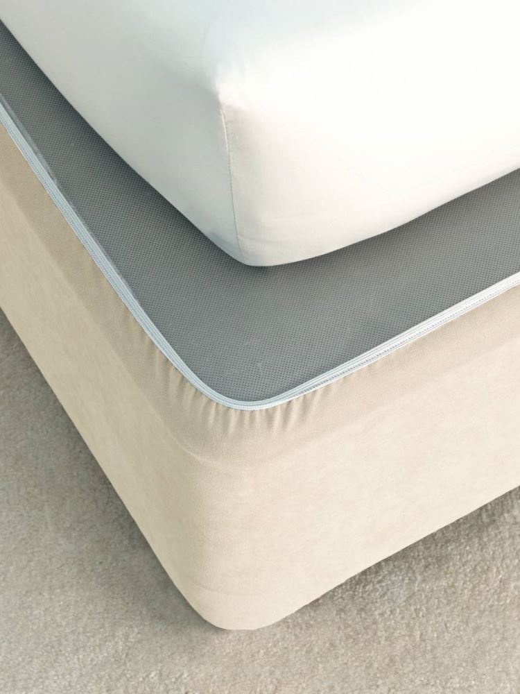 Elegant cream faux suede bedwrap for King Single beds, featuring adjustable edges for a tailored fit.