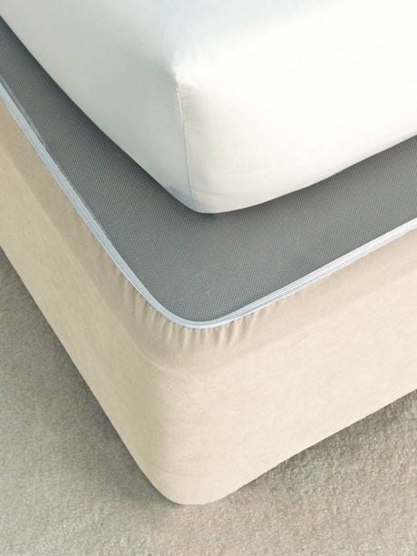 Elegant cream faux suede bedwrap for King Single beds, featuring adjustable edges for a tailored fit.