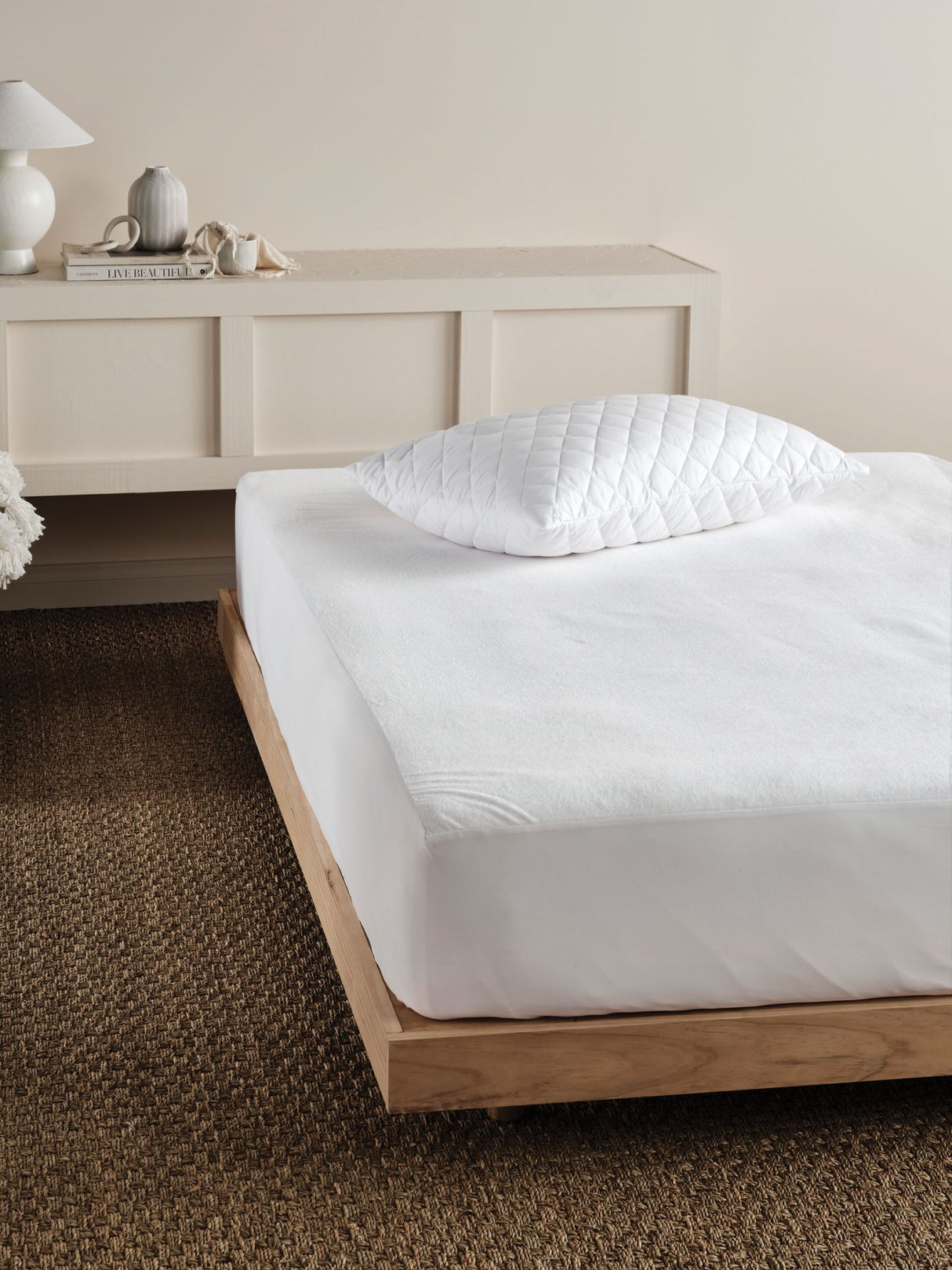 Everyday Waterproof Mattress Protector by Savona for queen beds, featuring soft cotton terry and waterproof backing for ultimate protection.