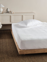 Everyday Waterproof Mattress Protector by Savona for queen beds, featuring soft cotton terry and waterproof backing for ultimate protection.