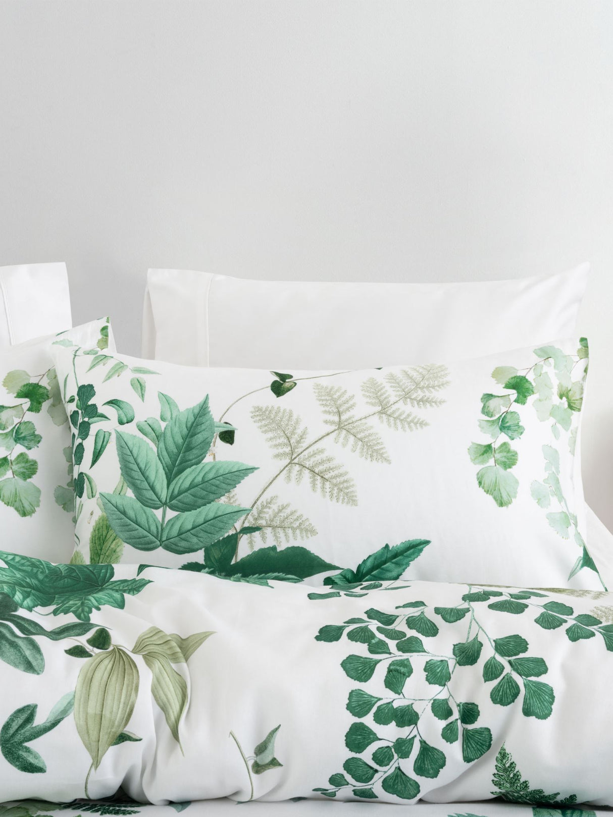 Luxurious Freya duvet cover set by Savona in white, featuring lush foliage design on soft 100% cotton sateen.