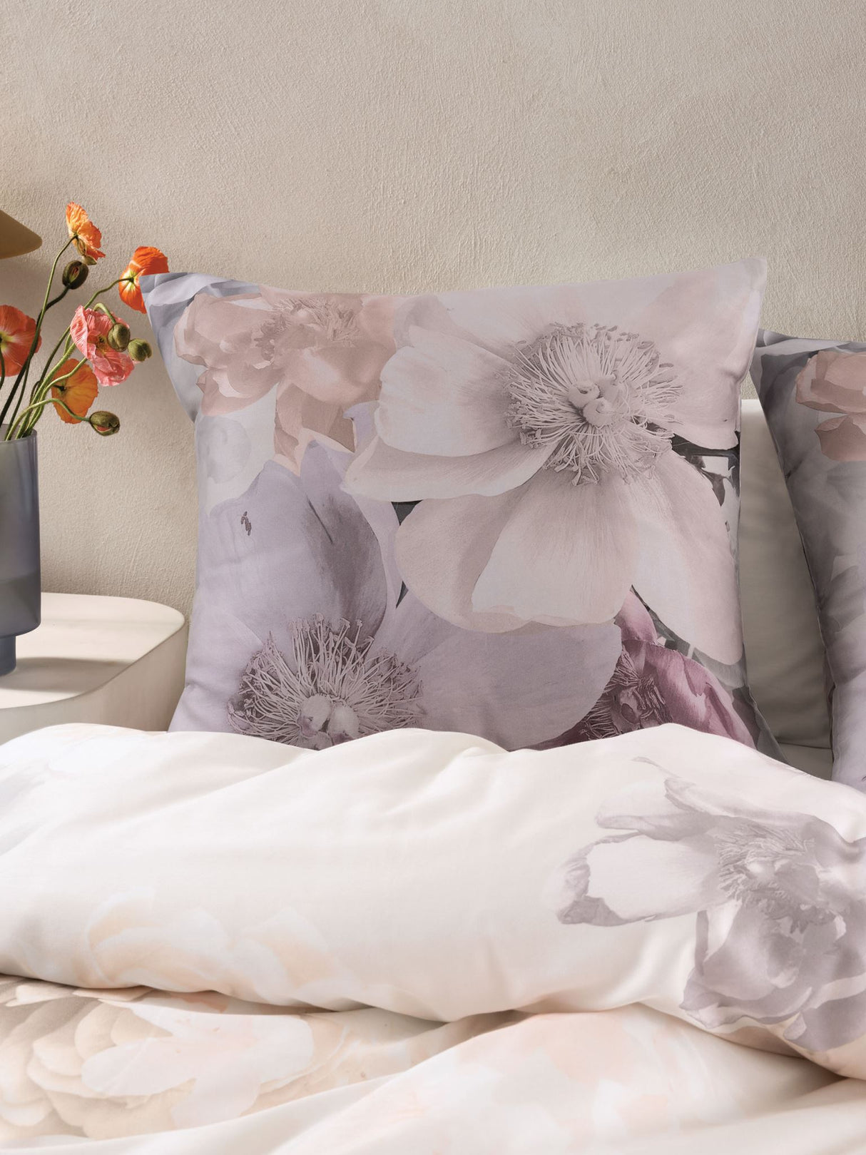King duvet cover set featuring romantic floral design in blush pink, white, apricot, and taupe on soft cotton sateen.