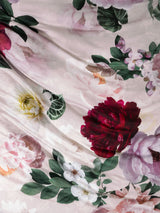 King duvet cover set by Savona in blush with large floral prints for a romantic, elegant bedroom aesthetic.