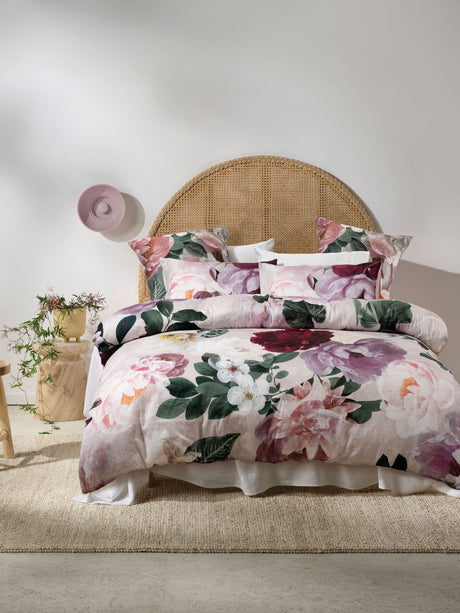 Blush King Duvet Cover Set by Savona featuring large floral patterns on soft cotton sateen for a romantic bedroom aesthetic.