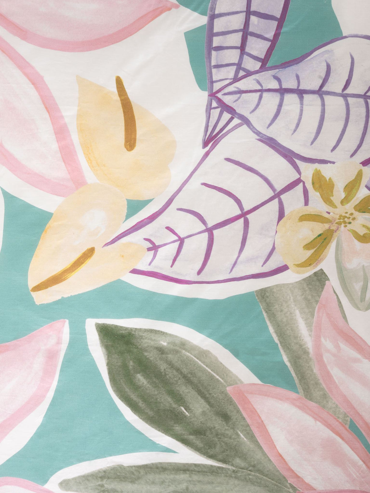 Californian King duvet cover set featuring hand-painted tropical foliage on turquoise, crafted from 100% cotton for luxurious comfort.
