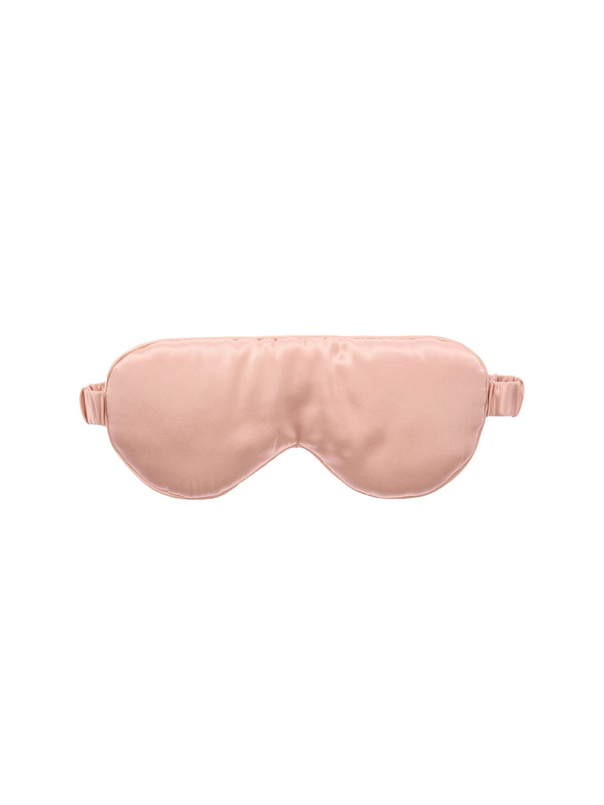 Soft blush silk sleep mask by Savona for comfortable light-blocking, protecting the delicate eye area for restful sleep.