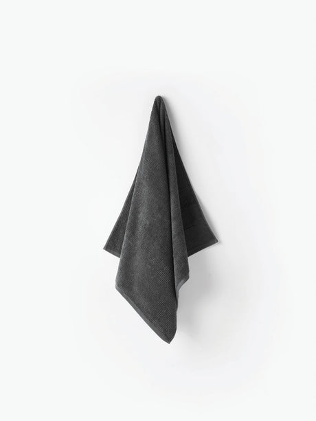 Luxurious charcoal bath mat by Savona, crafted from 900 GSM combed cotton for softness and quick drying, measuring 60x80cm.