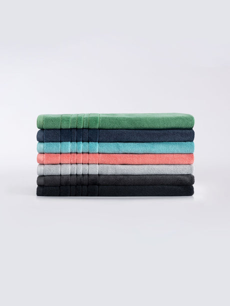 Peach Selene Bath Mat by Savona, crafted from 900 GSM cotton, featuring velour stripes for elegance and great absorbency.