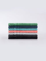 Luxurious Selene Hand Towel by Savona in serene Seaglass, featuring 550 GSM cotton and plush velour striped hem for elegant decor.
