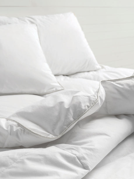 White king-sized duvet inner by Savona, featuring lightweight fluffiness, 100% cotton cover, and machine-washable convenience.
