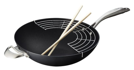 Scanpan Pro IQ 32cm Wok showcasing eco-friendly design, non-stick surface, and ergonomic handle for versatile cooking.