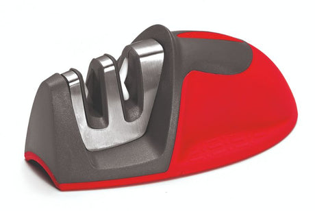 Scanpan Red Mouse Knife Sharpener with tungsten and ceramic stones, safety guard, and soft touch grip for effortless knife sharpening.