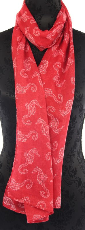 Vibrant red scarf featuring an elegant seahorse print, crafted from soft 100% polyester, measuring 45 x 180 cm.