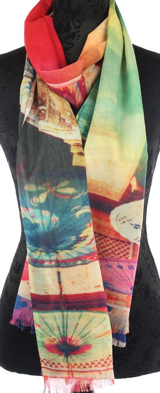 Vibrant scarf featuring a colorful umbrella print, perfect for any outfit; lightweight and versatile for year-round wear.