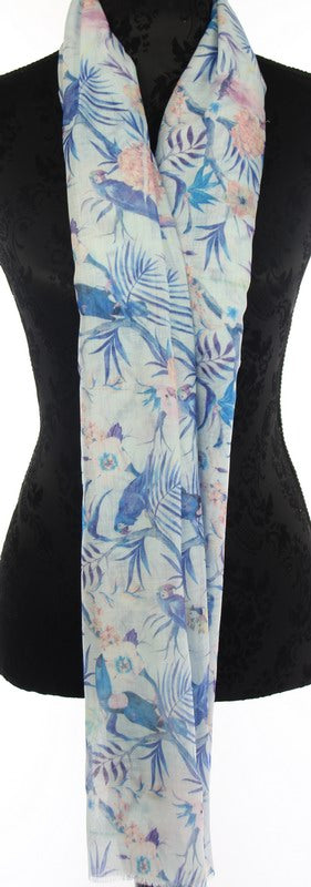 White scarf featuring parakeet and lorikeet print, lightweight 70x175cm with self-fringing, perfect for any occasion.