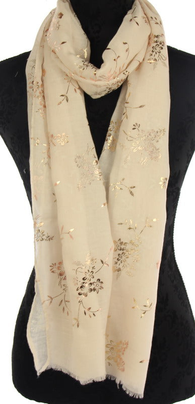 Elegant white scarf with shimmering rose gold floral design, soft fabric, perfect for versatile styling and layering.