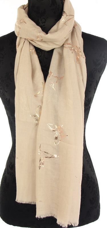 Taupe scarf featuring rose gold foil detailing, soft blend fabric, and versatile styling for elegant looks.