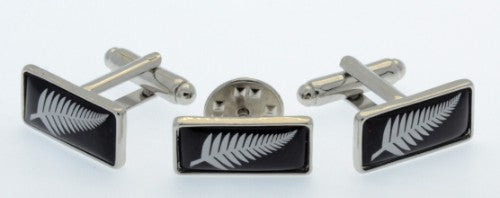 Elegant fern-themed cufflinks and lapel pin set in a sleek black box, perfect for formal occasions.