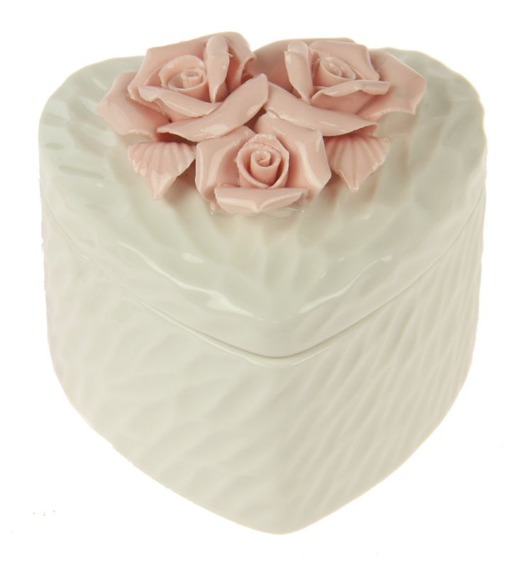 Elegant white ceramic trinket boxes with rose-embossed heart lids, perfect for storing jewelry and small treasures.