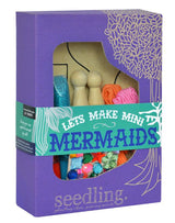 Colorful craft kit for kids to create unique mermaid peg dolls with sparkles, glitter, and imaginative accessories.