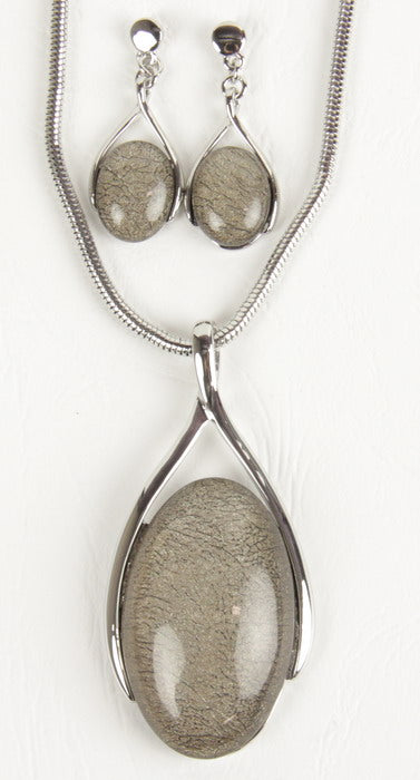 Grey resin earring and necklace set with silver swirl design, featuring elegant oval drop earrings on an 18-inch chain.