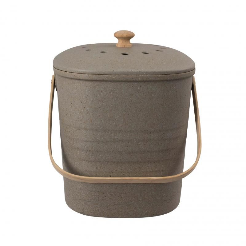 Compact grey bamboo compost bin with charcoal filter for odor-free food waste disposal in small kitchen spaces.