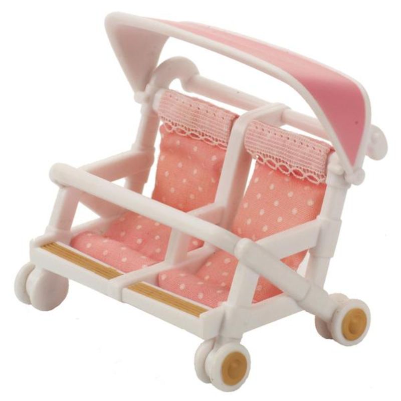 Sylvanian Families Double Push Chair with white frame, pink polka dot seats, and sun protector for side-by-side play.