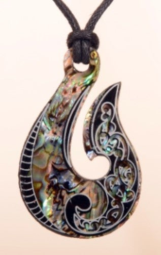 Vibrant Paua Fancy Hook pendant on adjustable black cord, symbolizing strength and good fortune, handcrafted from authentic shell.