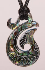 Paua Fancy Hook Pendant on black cord, showcasing vibrant blues and greens, symbolizing strength and good fortune.