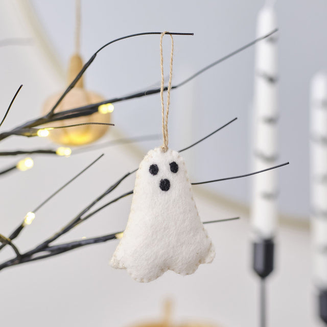 Handmade pumpkin spice felt ghost decoration with twine loop, perfect for Halloween trees and sustainable decor.