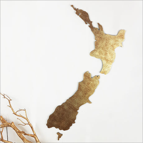 Antique gold textured wall art featuring small NZ maps and birds, perfect for enhancing any decor with elegance.