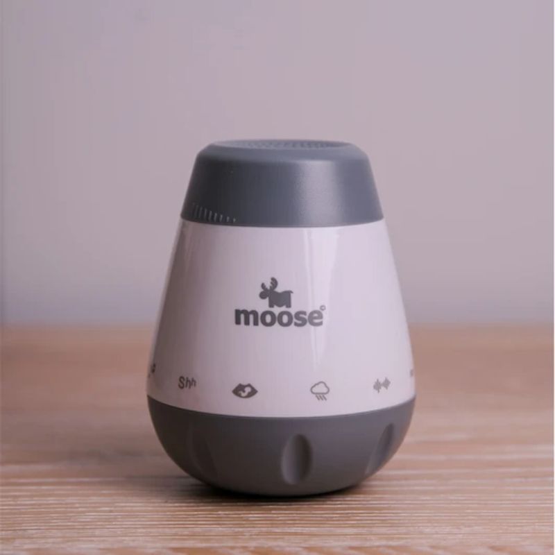 Moose Calm-a White Noise Machine for babies features six soothing sounds, cry activation, and portable design for restful sleep.