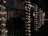 4M LED string lights with white cable and cool white glow, ideal for outdoor decoration and creating a magical atmosphere.