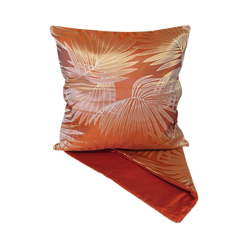 Silver palm design on burnt orange cushion cover, 44cm, adding a tropical touch to any decor.