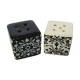 Elegant damask salt and pepper shakers in a gift box, perfect for enhancing any dining experience.