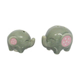 Charming ceramic elephant salt and pepper shakers, perfect for adding whimsy to your dining table decor.