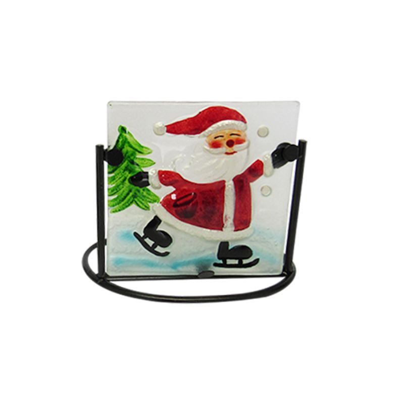 Festive tealight holder featuring a stained glass Santa in a black metal frame, perfect for holiday decor.