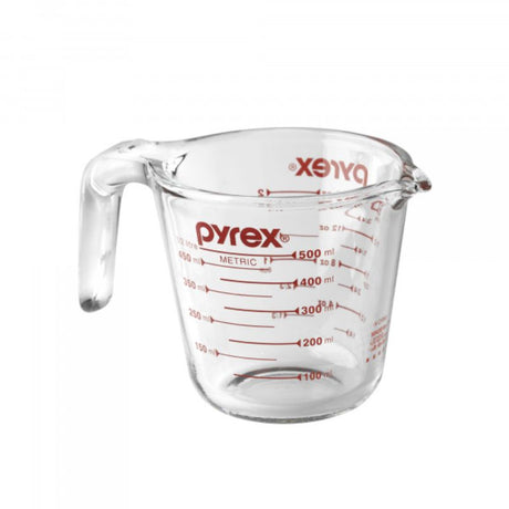 Clear glass Pyrex 2 Cup measuring jug with red markings, ergonomic handle, ideal for precise measuring and pouring in the kitchen.