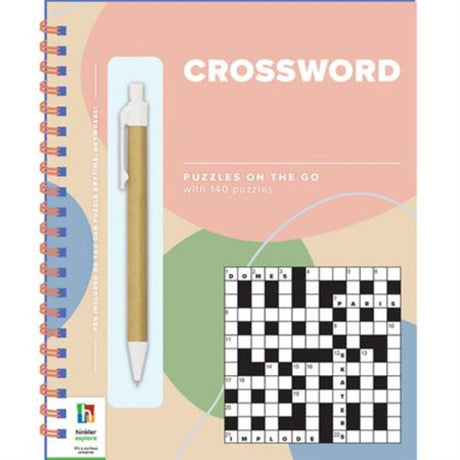 Portable crossword puzzle book with over 130 engaging puzzles, a handy pen, and contemporary artwork for puzzle lovers.